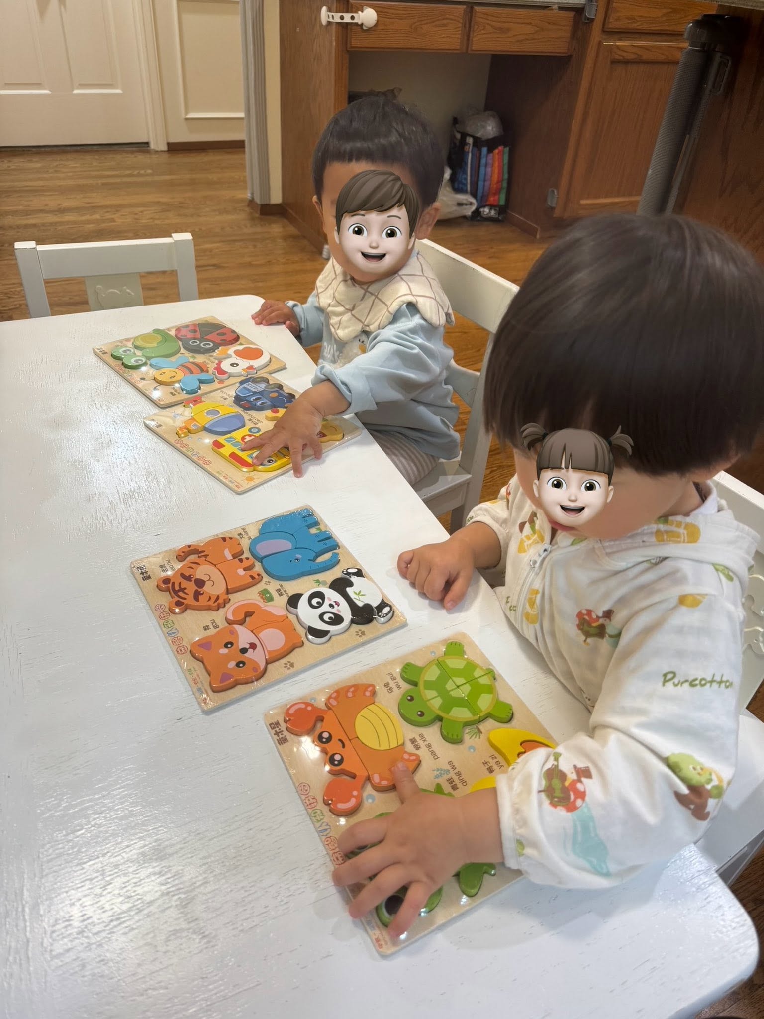 Panda Bear Childcare — children playing with wooden puzzles