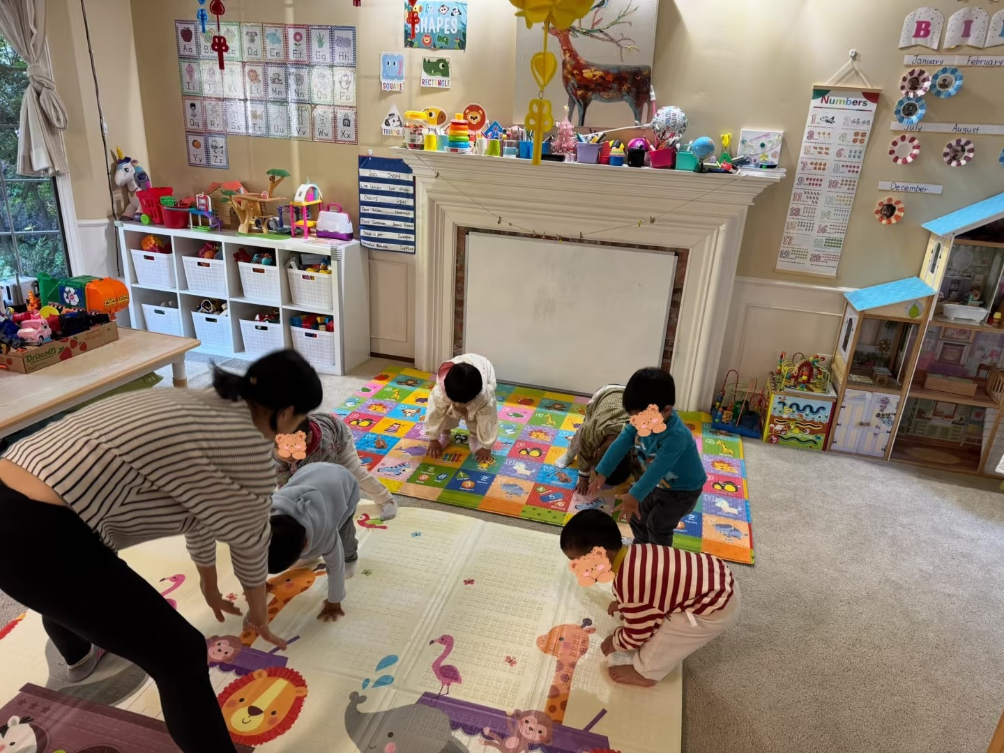 Panda Bear Childcare — toddlers playing in colorful classroom