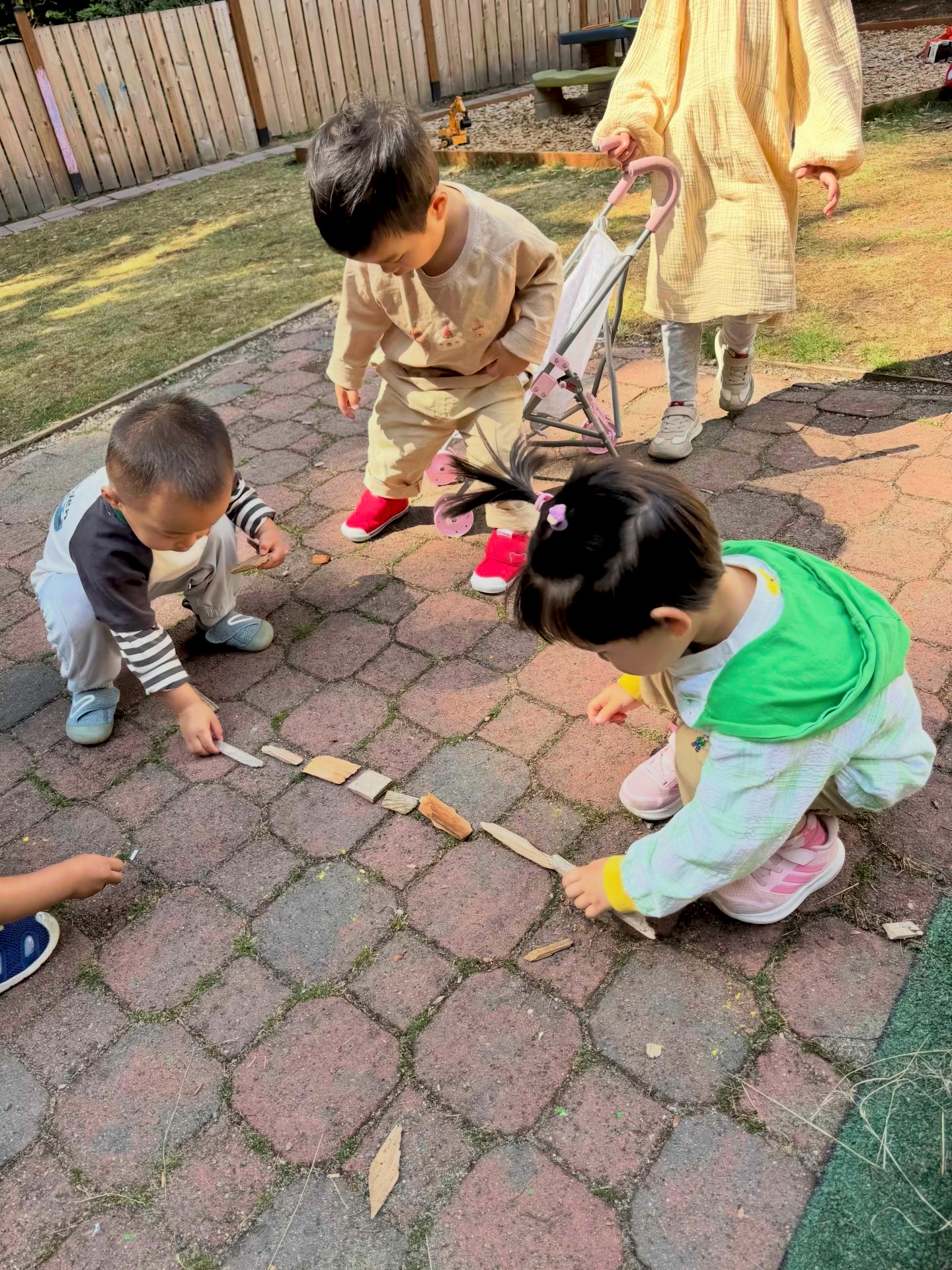 Panda Bear Childcare — children playing outdoor daycare yard