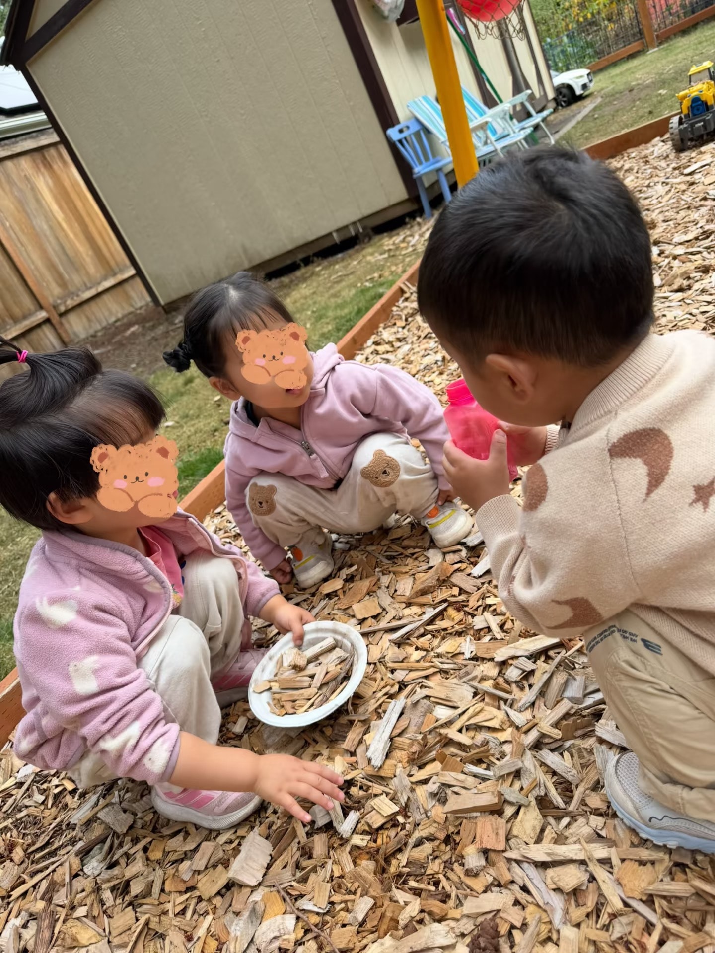 Panda Bear Childcare — children playing in sandbox outdoor